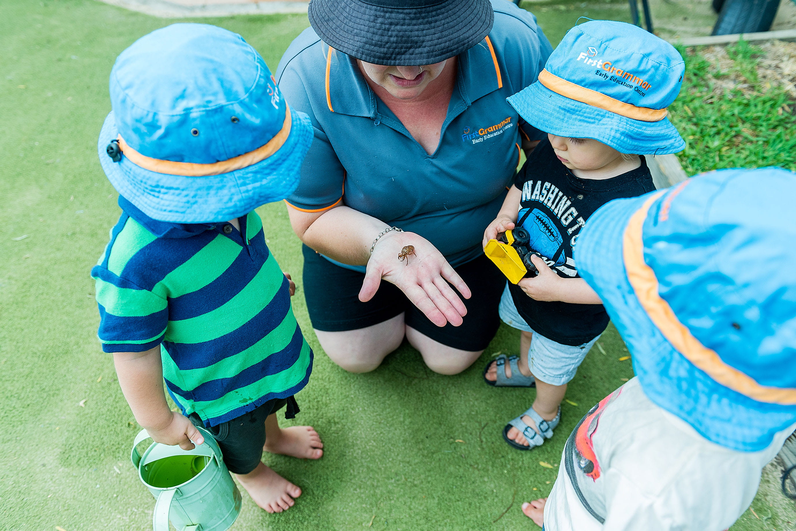 Children and educator playing at First Grammar Child Care Ourimbah
