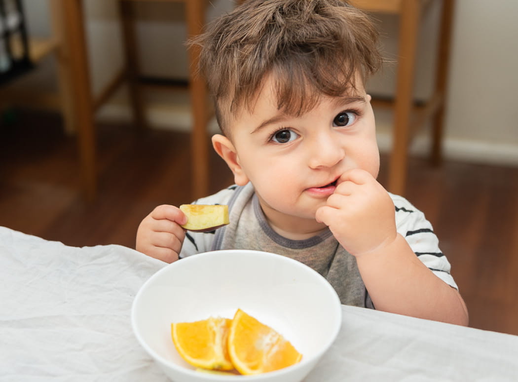 First Grammar early learning child with a bowl of nutritious food