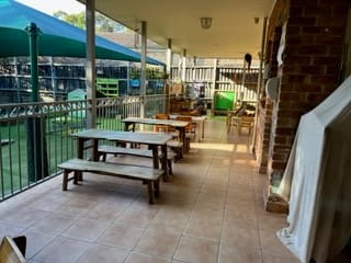 Outdoor seating area at First Grammar Castle Hill childcare