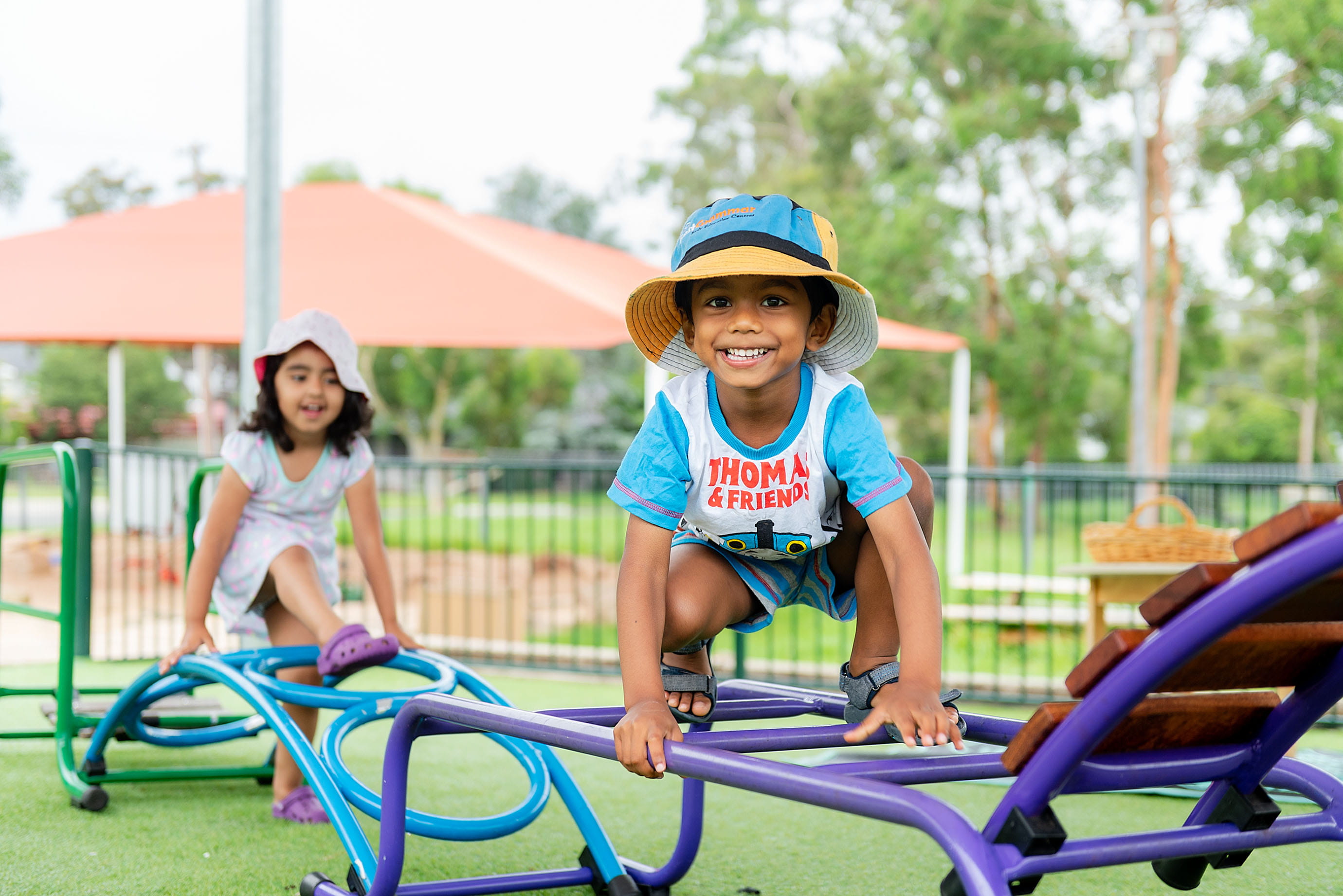 Kindergarten kids playing outdoors at Westleigh childcare centre